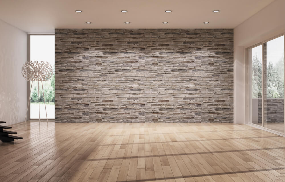 Eine Wandgestaltung mit Naturstein oder einer Steintapete kann ein tolles Highlight im Raum sein